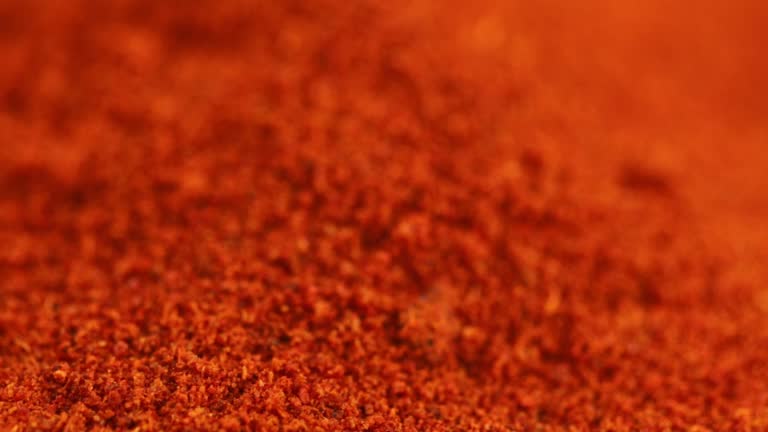 Fine Ground Paprika Falling In A Pile