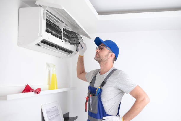istock Service guy cleaning and maintaining air condition unit. 1503857905