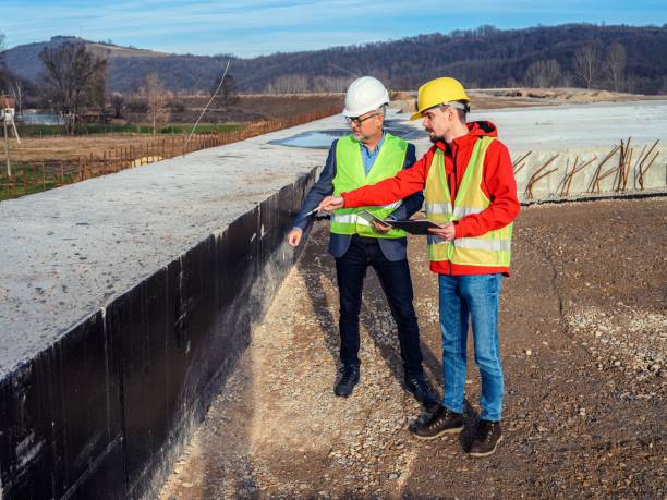 istock Engineer and investor on a road construction site 1503858972