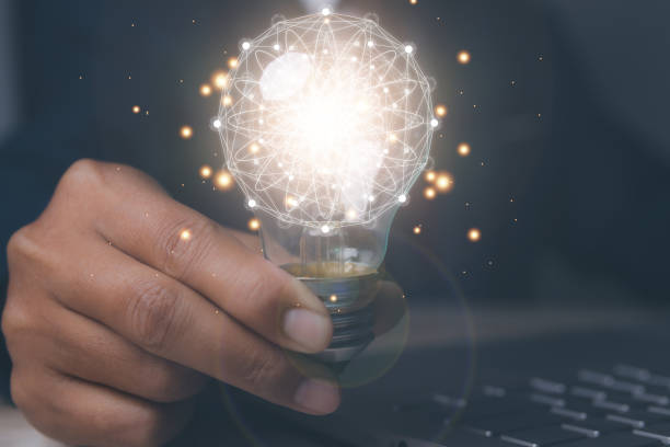 istock Man holding light bulbs the new ideas with innovation technology and creative. Business, Development, Concept creativity with bulbs that shine glitter. 1503860702