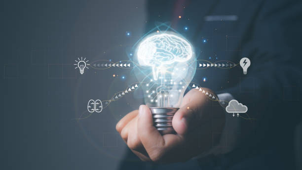 istock Businessman holding light bulb with brain icon of Brainstorming creative idea. 1503860747