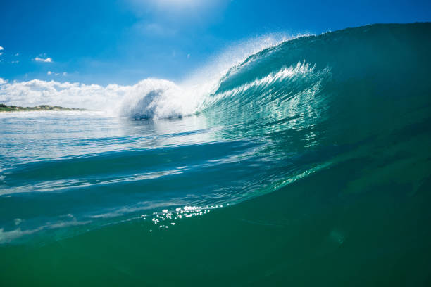 istock Turquoise barrel waves in blue ocean. Breaking wave ideal for surfing 1503861336