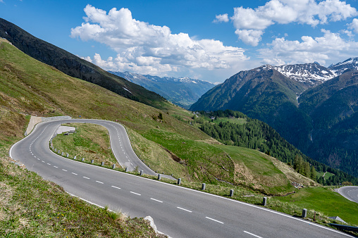 View along the Großglockner-Hochalpenstraße in the Austrian Alps near the Grossglockner Mountain during a beautiful springtime day high in the mountains.