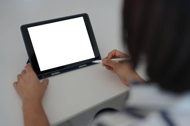 istock Close up a digital tablet using a smart pencil on the right hand side. 1503871471