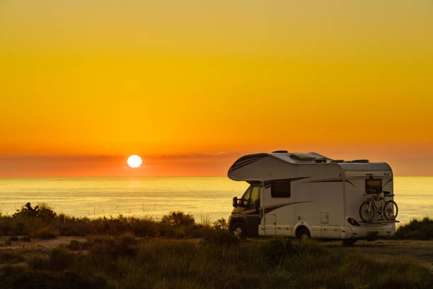 istock Caravan on sea at sunrise. 1503893304