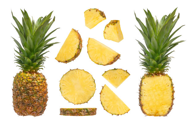 istock A large set of different parts of pineapple from different angles on a white isolated background. Juicy pineapple, slices with peel and long green leaves, isolated on white. High quality photo. 1503899409