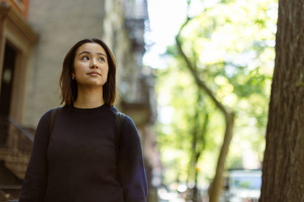istock Cute Asian Student Roams the West Village with Curiosity 1503900912