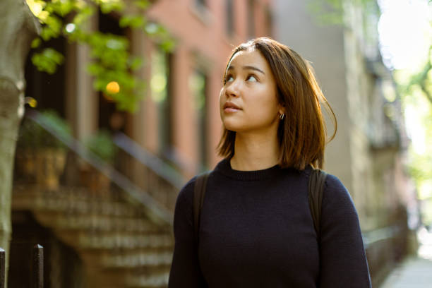 istock Cute Asian Student Roams the West Village with Curiosity 1503900915