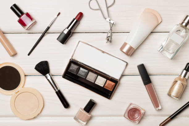 istock Different makeup products on wooden background, top view 1503903619
