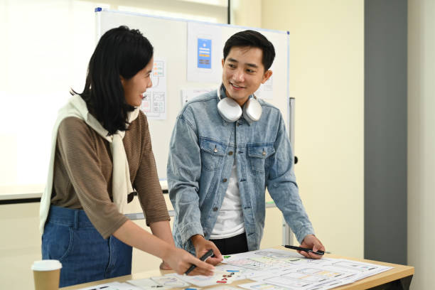 istock Creative business colleagues brainstorming, sharing idea for startup project in co working office space. 1503915795