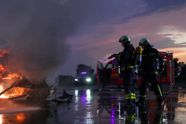 istock Firefighters fight the fire flame to control fire not to spreading out. Firefighter industrial and public safety concept. Traffic or car accident rescue and help action. 1503919359