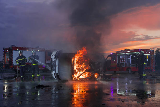 istock Firefighters fight the fire flame to control fire not to spreading out. Firefighter industrial and public safety concept. Traffic or car accident rescue and help action. 1503920478