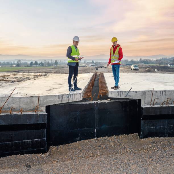 istock Engineer and investor on a road construction site 1503920540