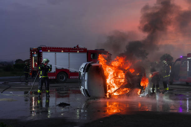istock Firefighters fight the fire flame to control fire not to spreading out. Firefighter industrial and public safety concept. Traffic or car accident rescue and help action. 1503920641