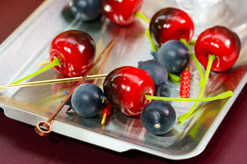 Cherries and blueberries on a plate