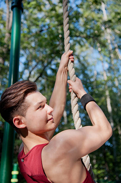 istock Young man doing fitness exercise 150393384