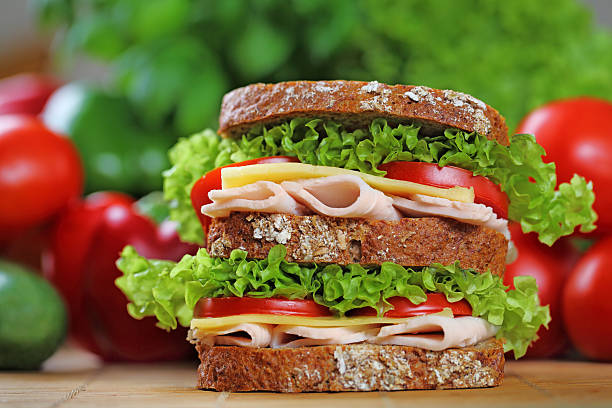 istock Double chicken brest, cheese and tomato sandwich. 150393403