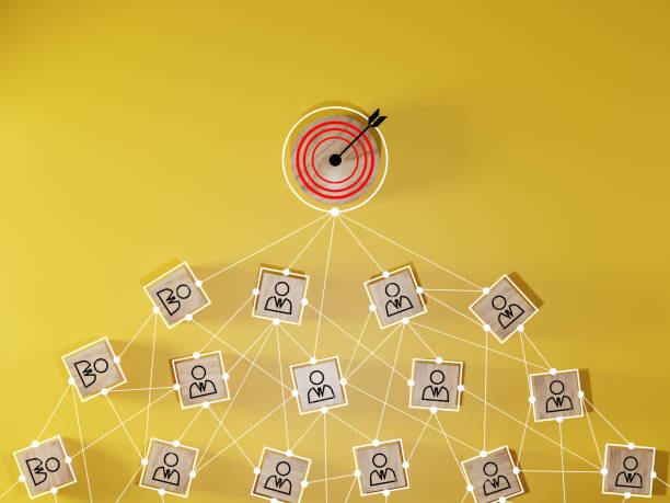 istock Red dartboard and black arrow connection linkage with human icon for customer focus target group and customer relation management concept. 1503934969