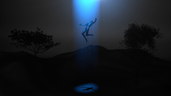 A UFO abduction scene. A man is paralyzed in a deserted place, teleporting to a UFO in the sky. Although extraterrestrial abduction cases are still considered conspiracy theories, the number of cases continues to increase day by day.