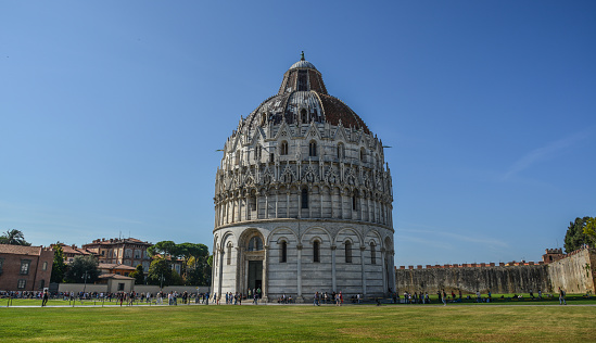 Pisa, Italy - Oct 18, 2018. View of the Pisa Baptistery (Piazza del Duomo). The complex recognized as an important centre of European medieval art.