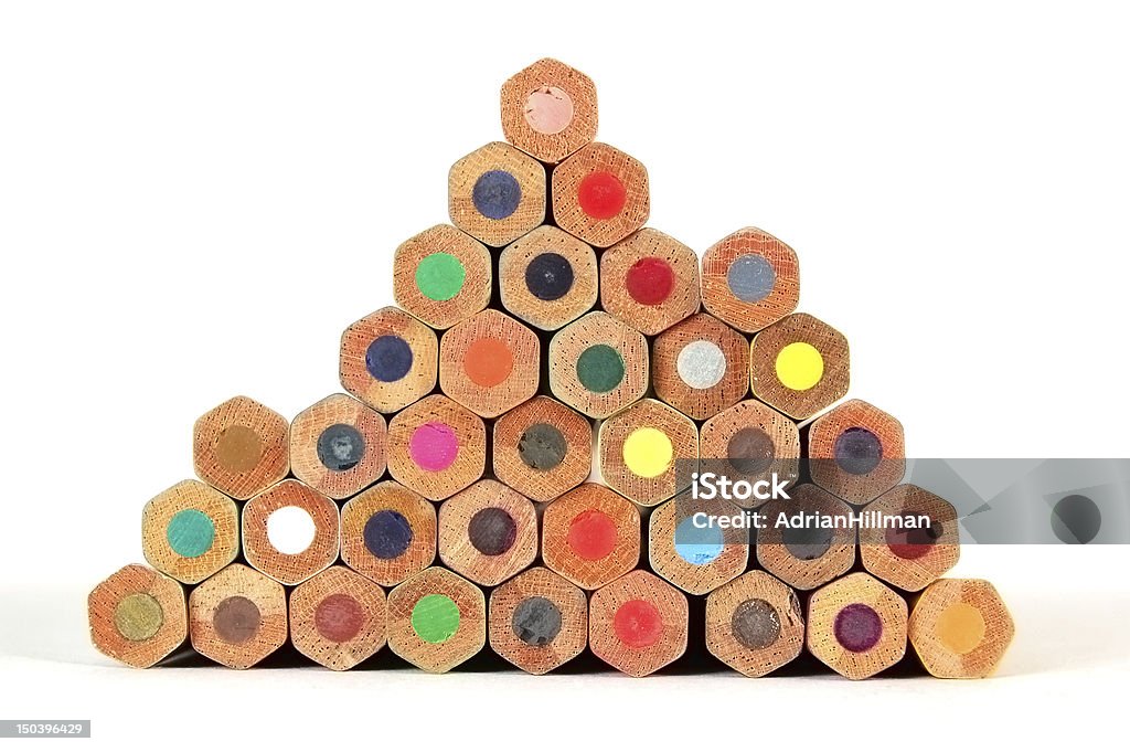 Pencils A pyramid stack of colored pencils with clipping path Tessellation Stock Photo