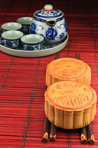 istock Moon cakes  on a wooden chopsticks. 150397861