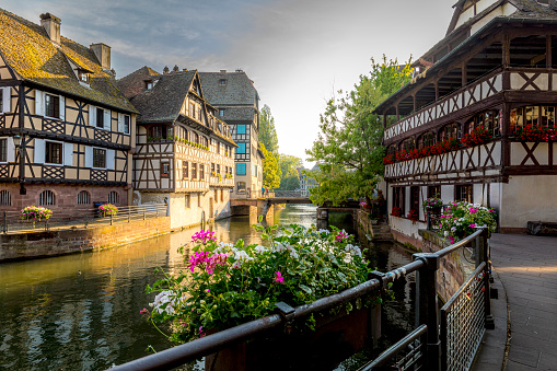 Strasbourg, France - June 19, 2023: Traditional half-timbered houses in La Petite France at sunset, Strasbourg, Alsace, France