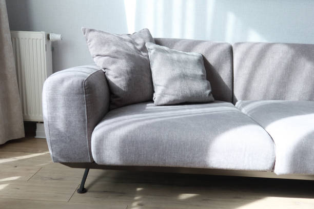 istock modern grey sofa with pillows in living room at home 1503982180