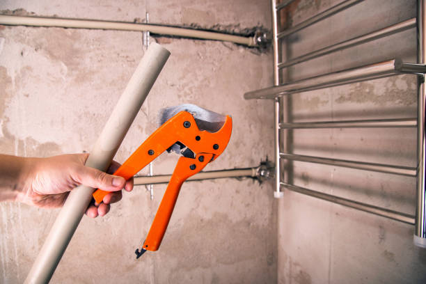 istock Scissors for cutting polypropylene pipes in plumbing, close-up 1503994331