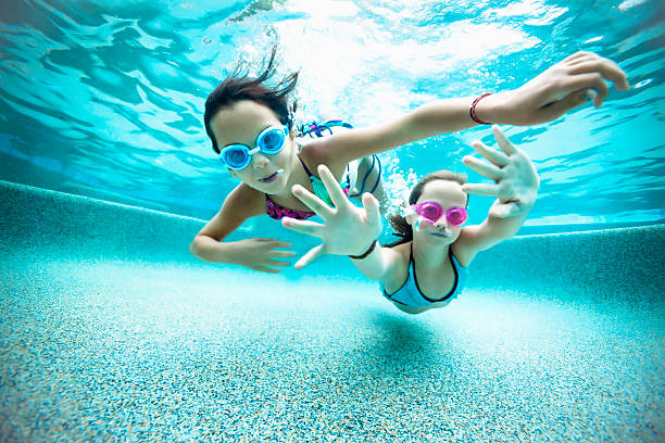 Underwater swimming perspective stock photo