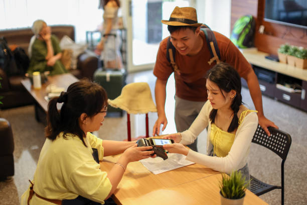 istock Guests and hoteliers use digital payment for check-in 1504016977