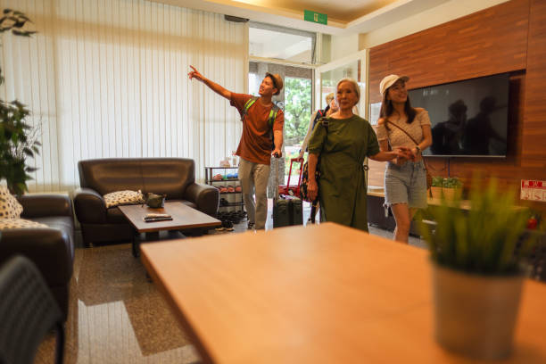 istock The hotel owner warmly welcomes the guests 1504018598
