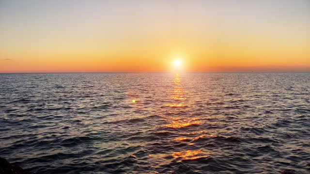 Beautiful sunset at sea. Summer vacations background
