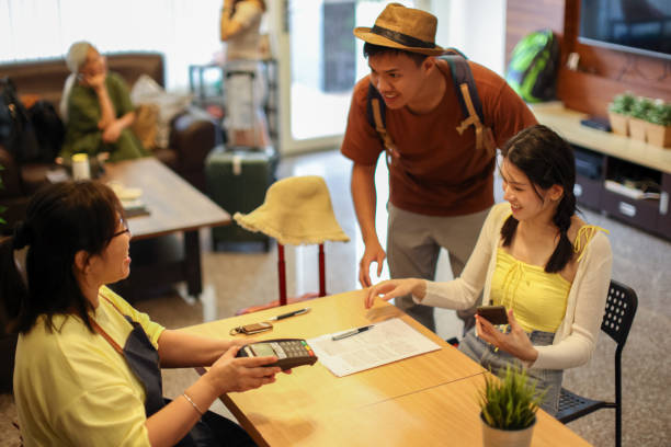 istock Guests and hoteliers use digital payment for check-in 1504021330