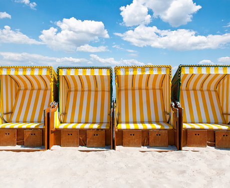 Vacations on the Baltic Sea. Beach chairs are ready for the guests for the coming summer season.