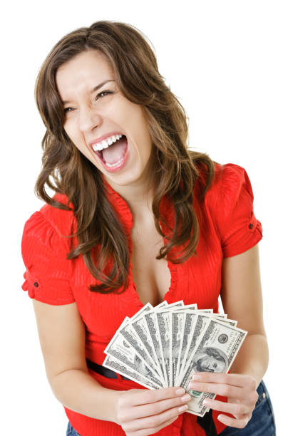 istock Young happy woman with money 1504040119