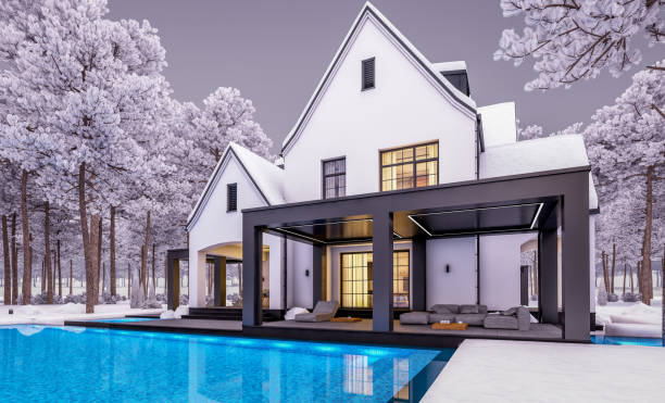 istock 3d rendering of white and black modern Tudor house in winter evening 1504040726