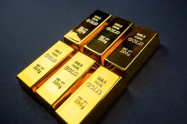 istock Gold bars isolated on black background 1504045082