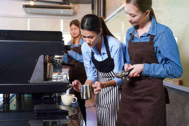 Group young woman people leaning and education workshop for classes barista coffee in cafe room