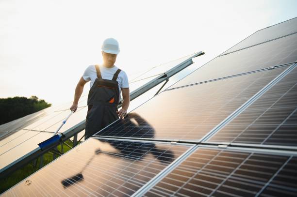 istock man cleaning, solar power washing 1504063142