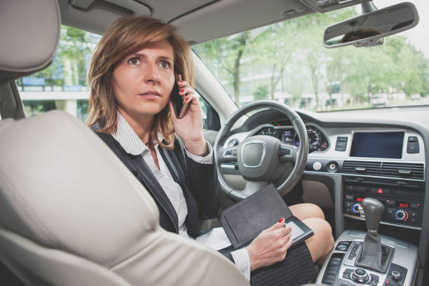 istock Businesswoman in a car 1504065511