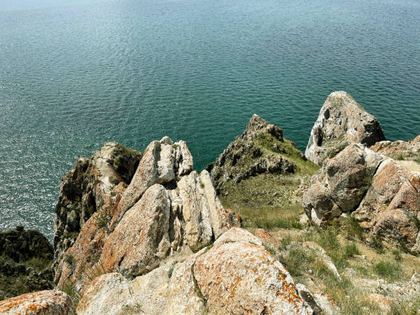 istock Rock Three Brothers, Cape Sagan-Khushun on Olkhon Island. Baikal, Russia 1504074355