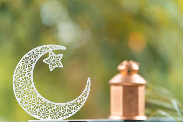 istock Beautiful half moon shape with lantern lamp on the background 1504093871