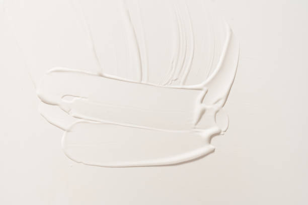 istock A white cosmetic smear on an isolated white background. Sample for advertising and packaging. The texture of a white face cream. Cosmetic skin care product with copy space. High quality photo 1504095004