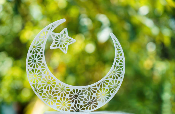 istock Islamic concept image beautiful half moon shape isolated on green backgroun 1504098876