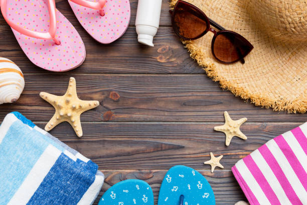 istock Summer vacation concept flat lay. straw hat beach accessories and towel top view. Space for text. travel concept 1504100002