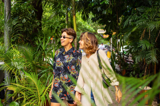 istock Same-sex couple walking down the street 1504101235