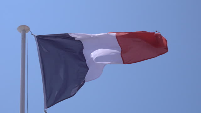 France national flag waving in the wind on a flagpole