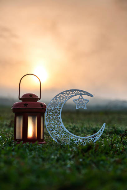 istock Eid Mubarak concept photo Traditional Ramadan Lantern lamp with crescent moon 1504110704