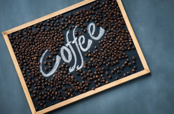 istock Coffee beans on a black board with coffee letter 1504117741